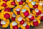 India, Uttar Pradesh, Varanasi, Bangali Tola. Selling offerings of flowers and candles. Art Print